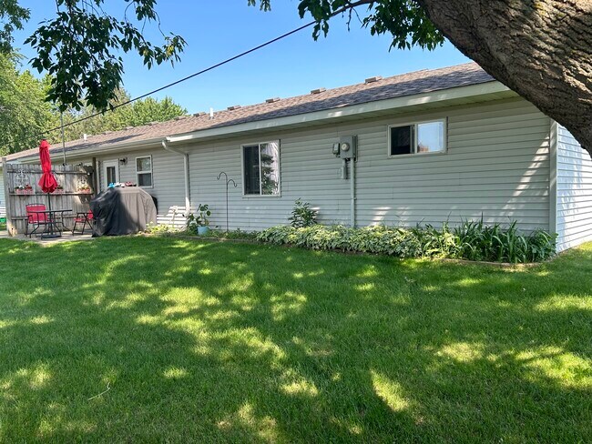 Back view with patio. - 403 E Soo St