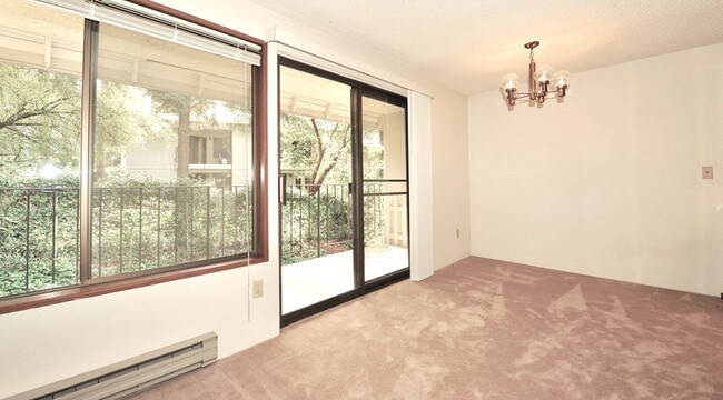 Building Photo - Bright Top Floor End Unit