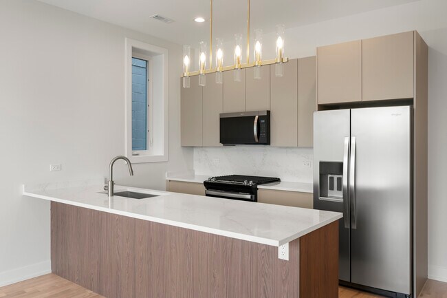 Foto del edificio - 428 E 50th Pl