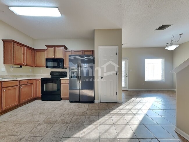 Building Photo - 7411 Appling Rain Dr