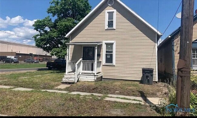 Building Photo - OWNER FINANCING