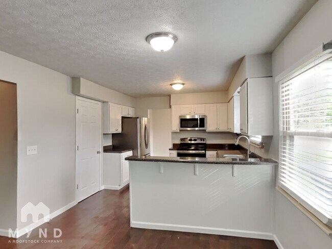 Foto del edificio - 6576 Canby Pl