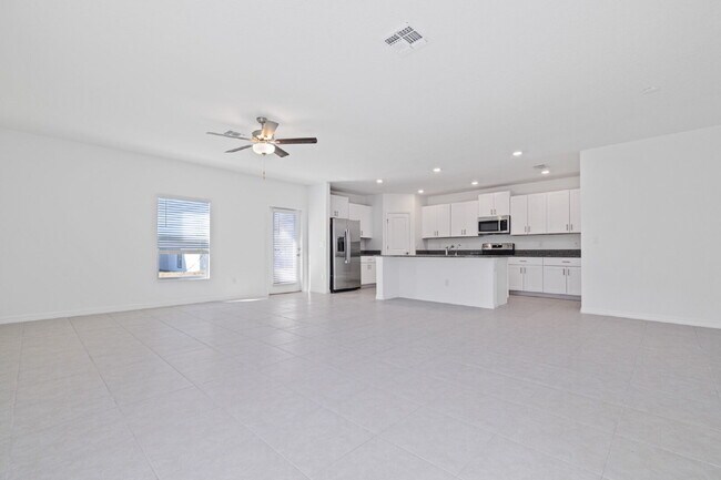 Building Photo - "Spacious 5-Bed Gem in Epperson community ...