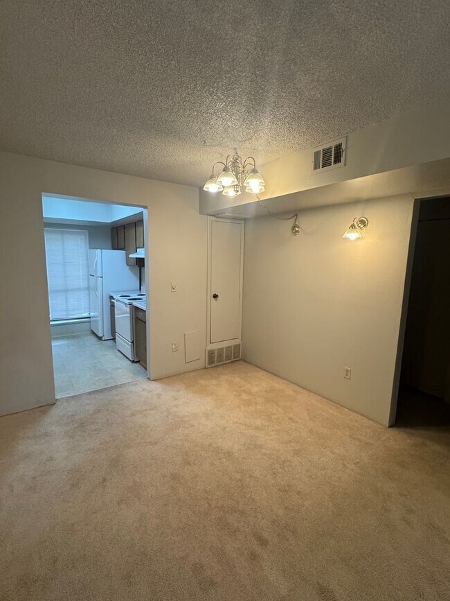 Building Photo - Spacious 2-Bedroom, 1.5-Bath Condo in Bear...