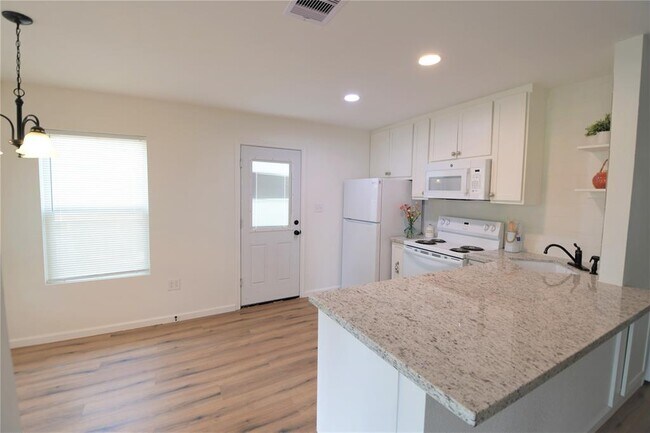 Foto del edificio - 5424 Pine Ave