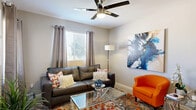 Located at 1601 Vineyard Rd in Roseville, CA, this well-appointed 2-bedroom, 2-bathroom residence offers a thoughtfully designed single-floor layout. The open-concept living and dining area serves as the heart of the home, featuring plush carpeting, large windows with blinds and drape panels that invite abundant natural light, and a ceiling fan overhead. The living room provides generous space for entertaining, while the adjacent dining area flows seamlessly toward the kitchen. The kitchen is outfitted with gray shaker-style cabinetry, light quartz countertops, stainless steel appliances including a range, microwave, and dishwasher, and wood-look flooring that adds warmth to the space. Both bedrooms are comfortably sized, each featuring ceiling fans, carpeted floors, and their own dedicated closets — including a spacious walk-in closet in the primary bedroom. The two bathrooms are clean and functional, with one featuring a tub-shower combination and wood-look flooring. Additional highlights include a hallway connecting the private spaces, a dedicated laundry area, four closets throughout for generous storage, and a balcony that extends the living space outdoors. The overall ambiance is modern and inviting, with a neutral color palette throughout.