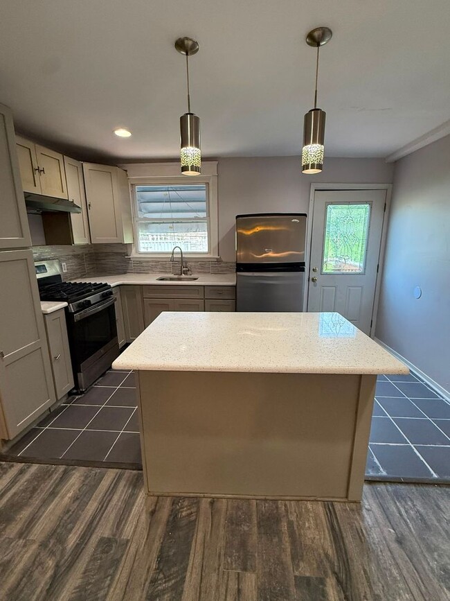 Photo - Spacious 2BR Home with Finished Basement  Central Air  $1,600/month