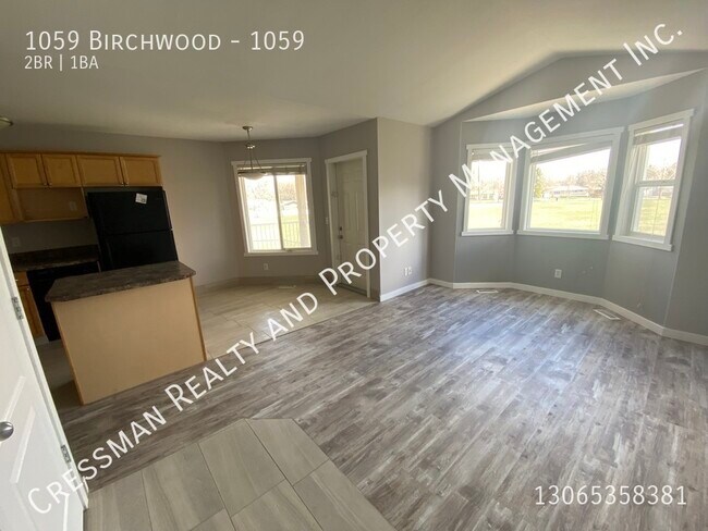 Building Photo - Upper level condo in South Regina
