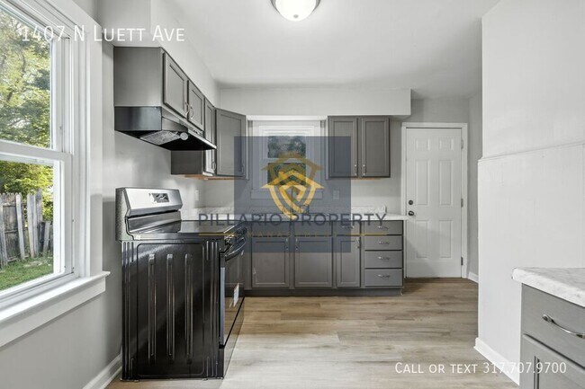 Building Photo - 1407 N Luett Ave