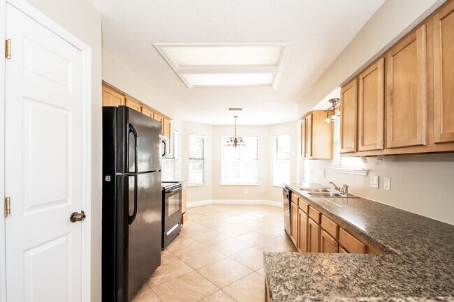 Building Photo - 7850 Collins Ridge Blvd E