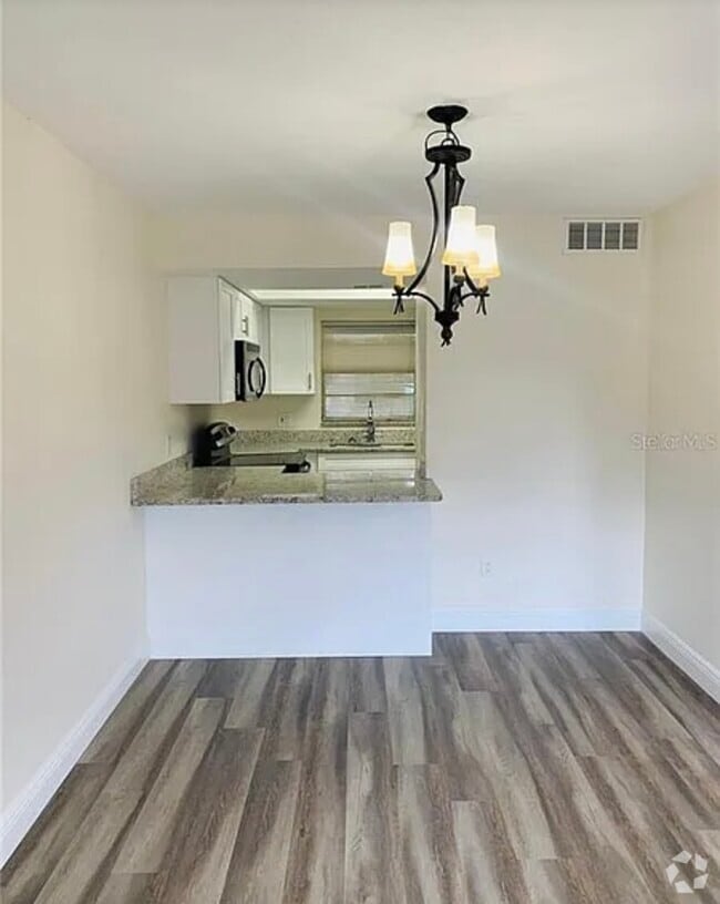Building Photo - 5161 Tennis Court Cir