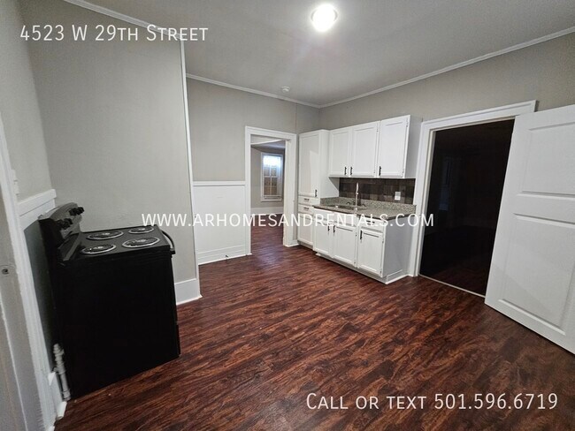 Building Photo - 4523 W 29th Street | $995 | 3 beds, 1 full...