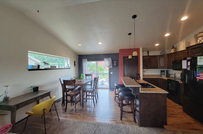 Building Photo - Spacious 4BR Home with Walkout Deck & Attached Garage!