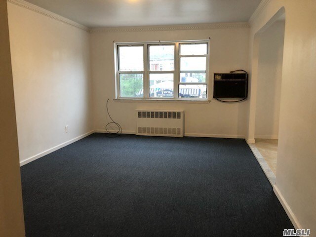Building Photo - 52-30-52-69 69th St