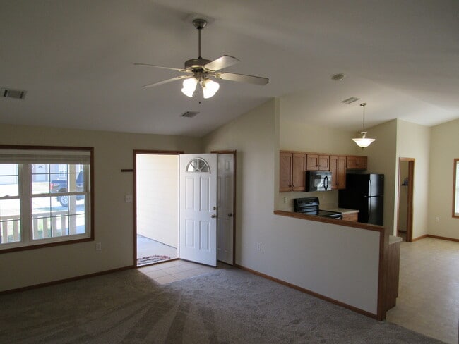 Building Photo - Attached Garage + Fenced-in Backyard + Vau...