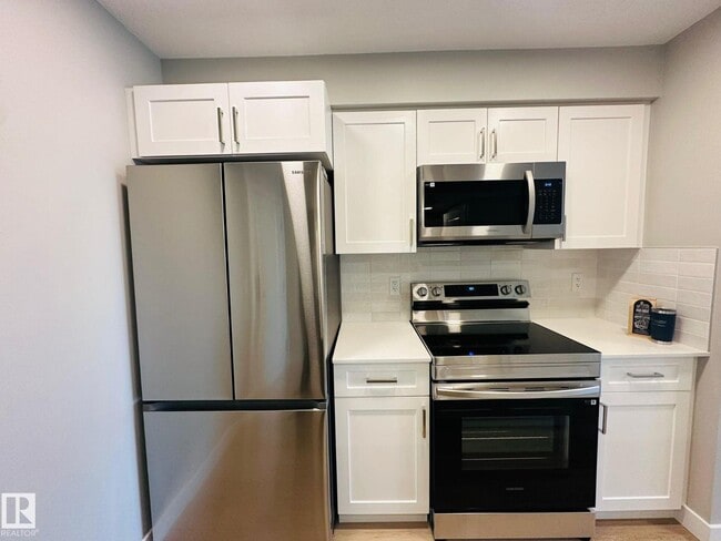 Building Photo - #320 1506 TAMARACK BV NW
