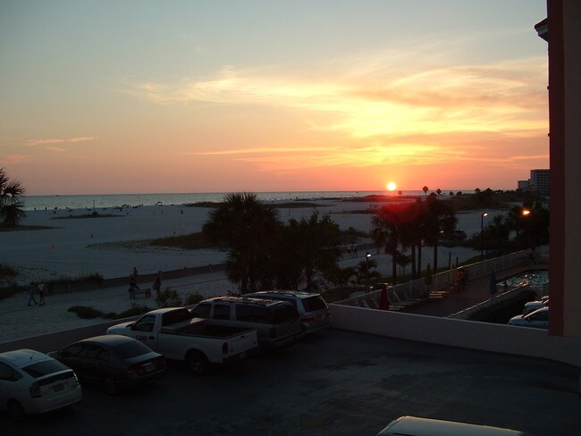 Sunset from patio - 11000 Gulf Blvd Apartment