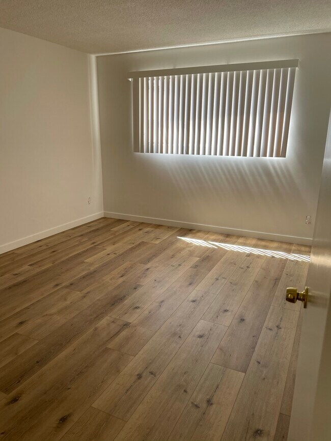 Bedroom 1 with 96 inch wide closet - 12850 Oxnard St