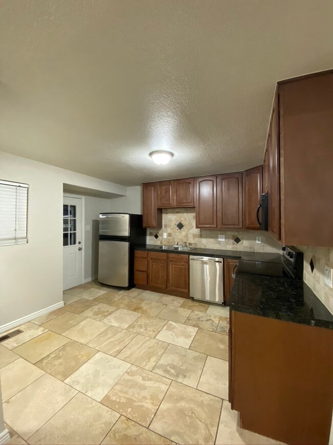 Building Photo - 2190 E 95th Ave