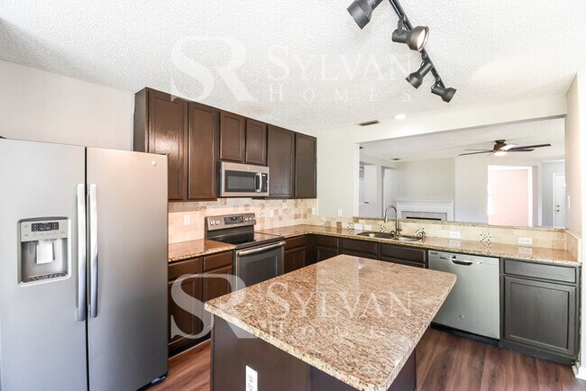 Building Photo - This charming home is move-in ready