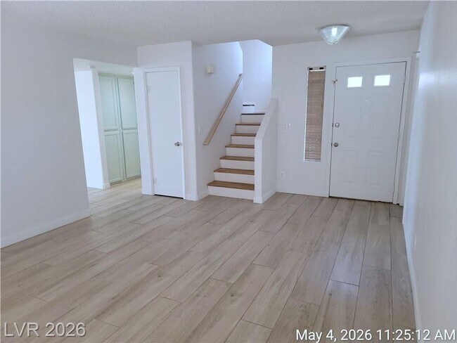 Building Photo - The Lakes Home with No Carpet, Fireplace & Covered Patio