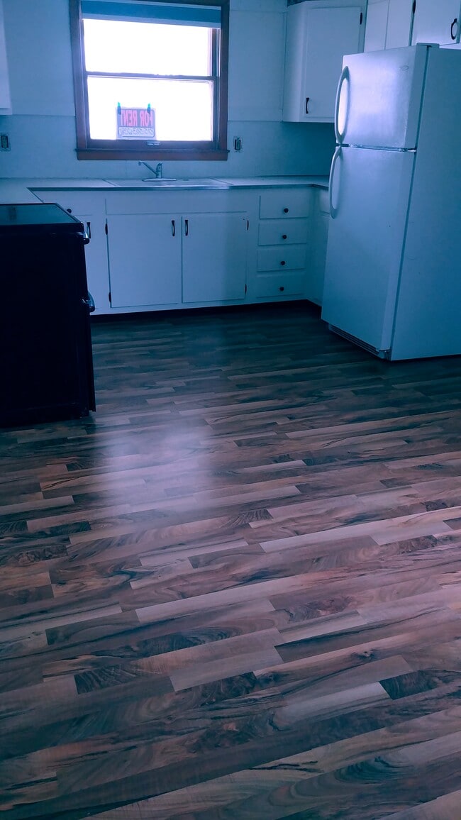 New kitchen flooring. - 204 N Jackson St