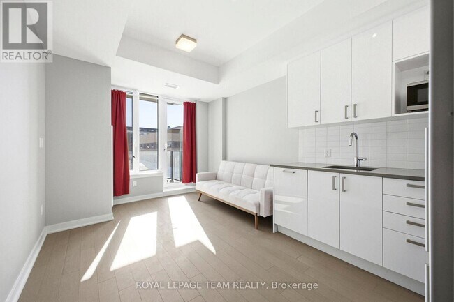 Building Photo - 209 - 360 DESCHATELETS AVENUE E