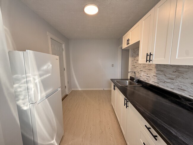 Photo du bâtiment - 61 Curry St