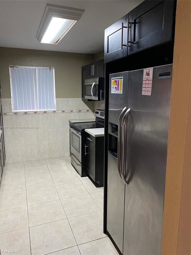 Foto del edificio - 3 br, 2 bath House - 1811 NW 36th Ave