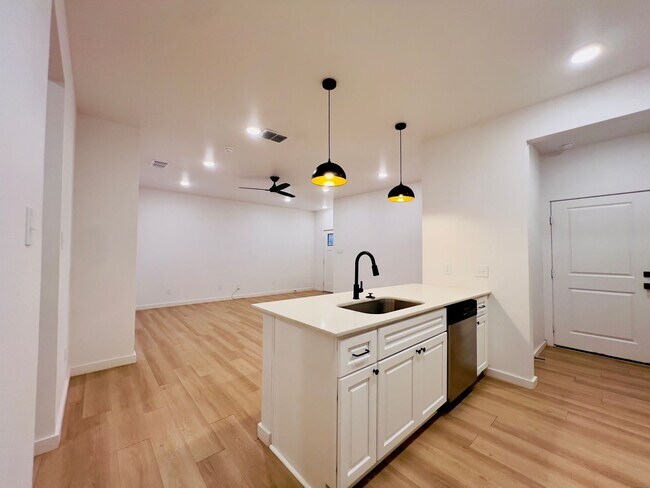 Building Photo - PRE-LEASING FOR AUGUST! Spacious 3-Bedroom Townhouse Near Texas Tech