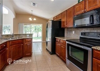 Foto del edificio - 3659 Bristol Cove Lane, Saint Cloud, FL, 3...
