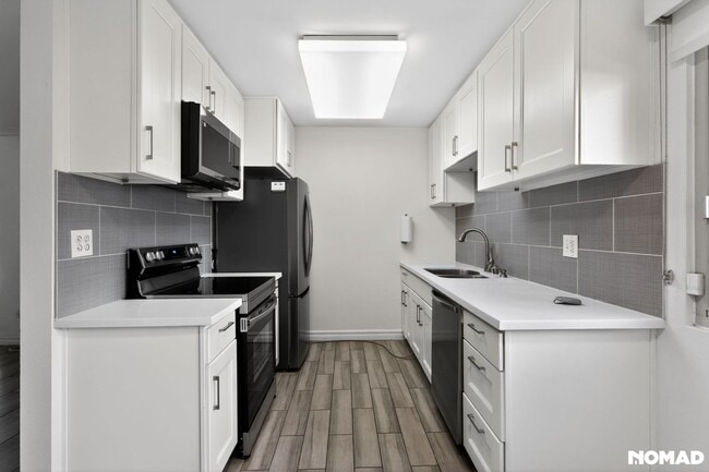 Building Photo - 8650 Belford Ave