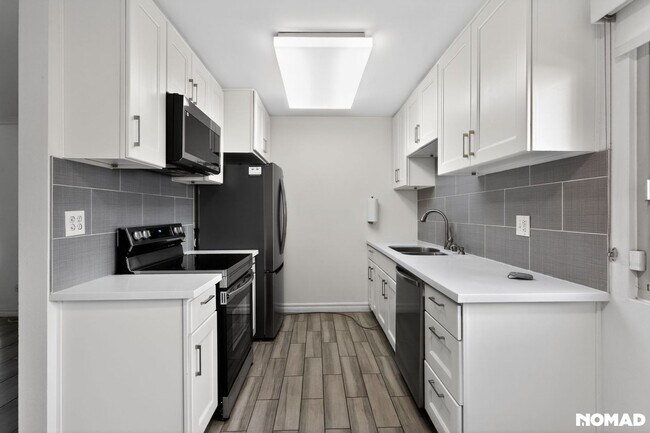 Foto del edificio - 8650 Belford Ave