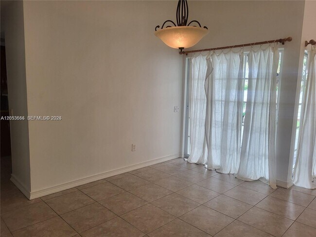 Building Photo - 14419 SW 142nd Ct