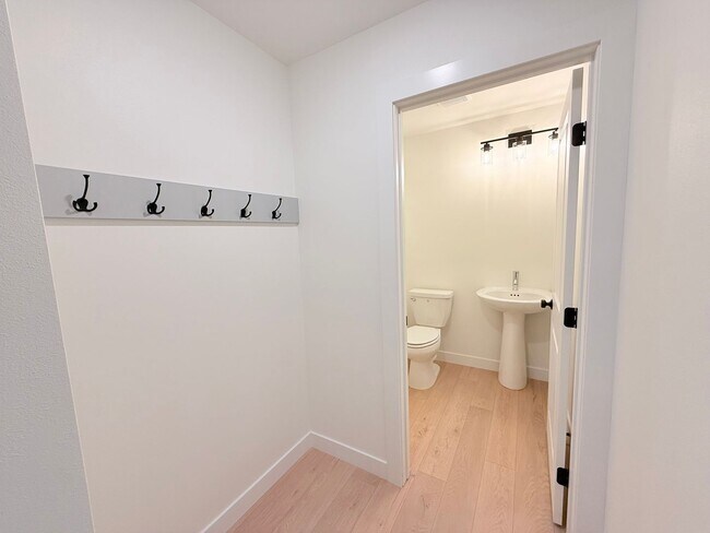 Building Photo - Sleek & Spacious New Build with Premium Finishes