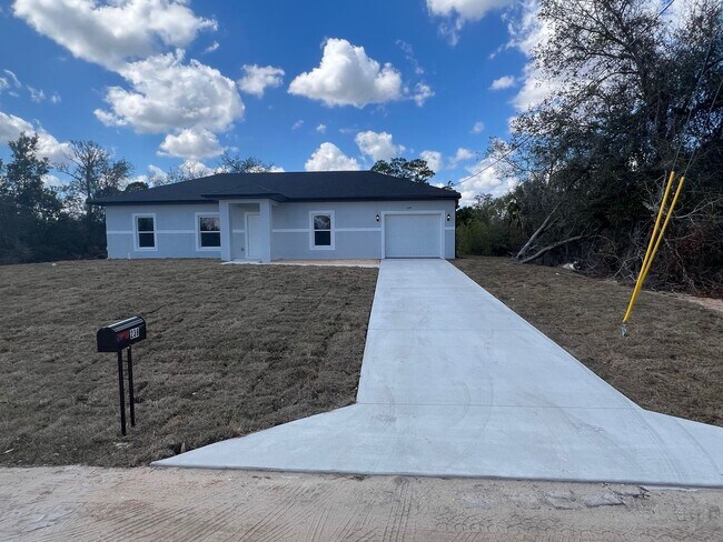 Foto del edificio - Brand-New 3BR/2BA Home with Garage – Serene Lake Placid Neighborhood