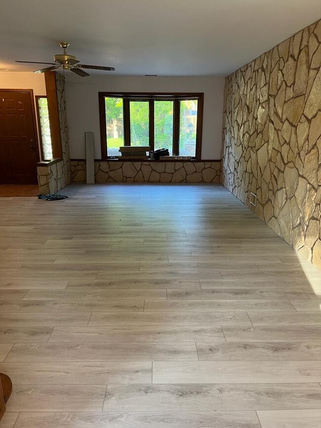 Family room with brand new flooring - 625 Hillcrest Rd