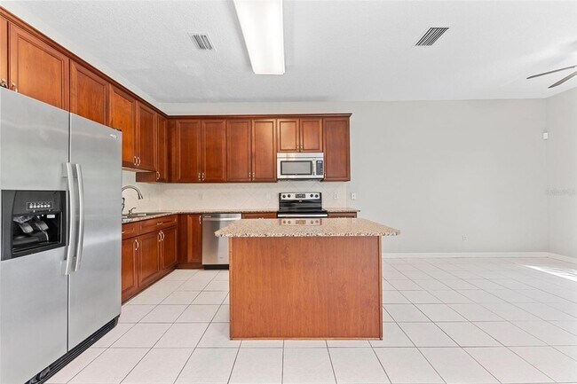 Foto del edificio - 9228 Stone River Pl