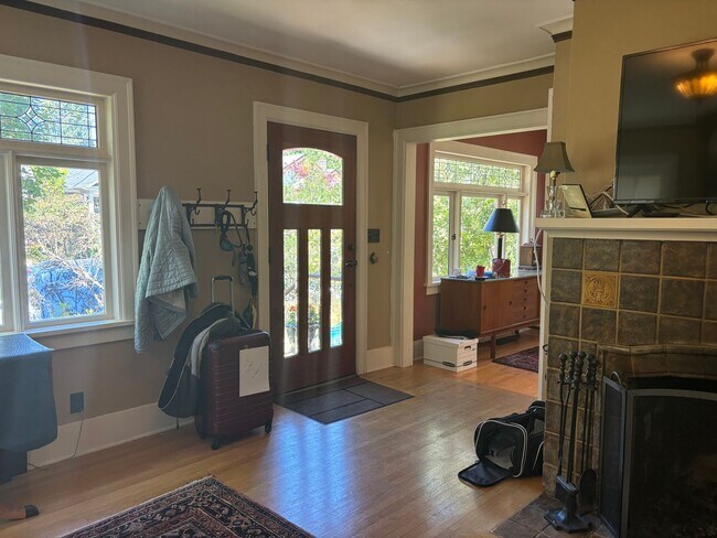 Building Photo - Classic Craftsman Home with Modern Comfort...