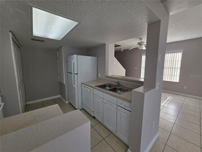 Building Photo - 406 Washington Palm Loop