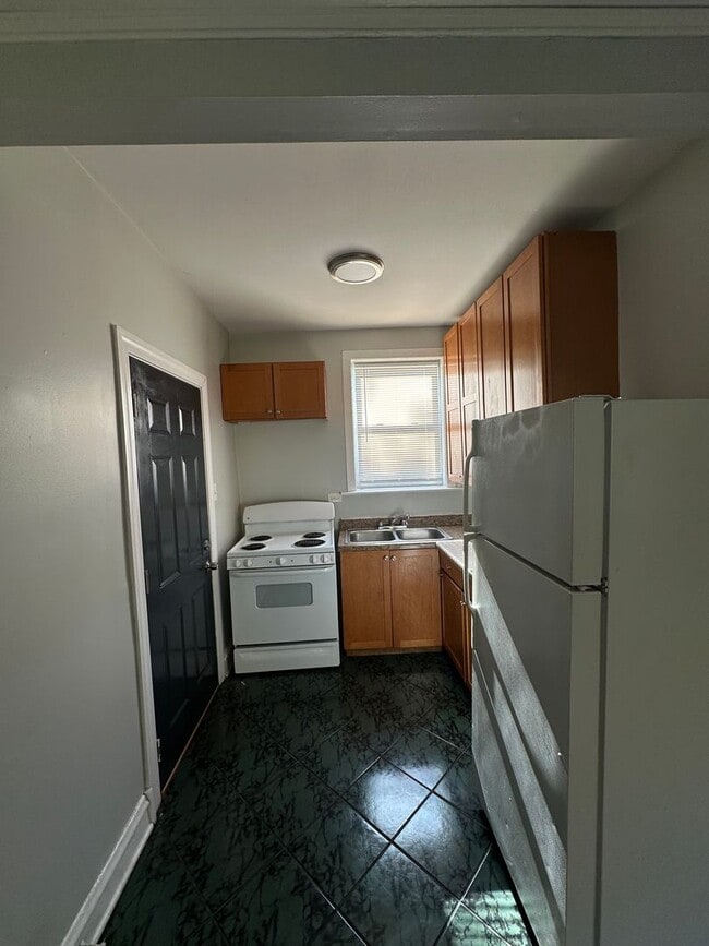 Foto del edificio - Cozy 1-Bedroom Apartment with Office Nook ...