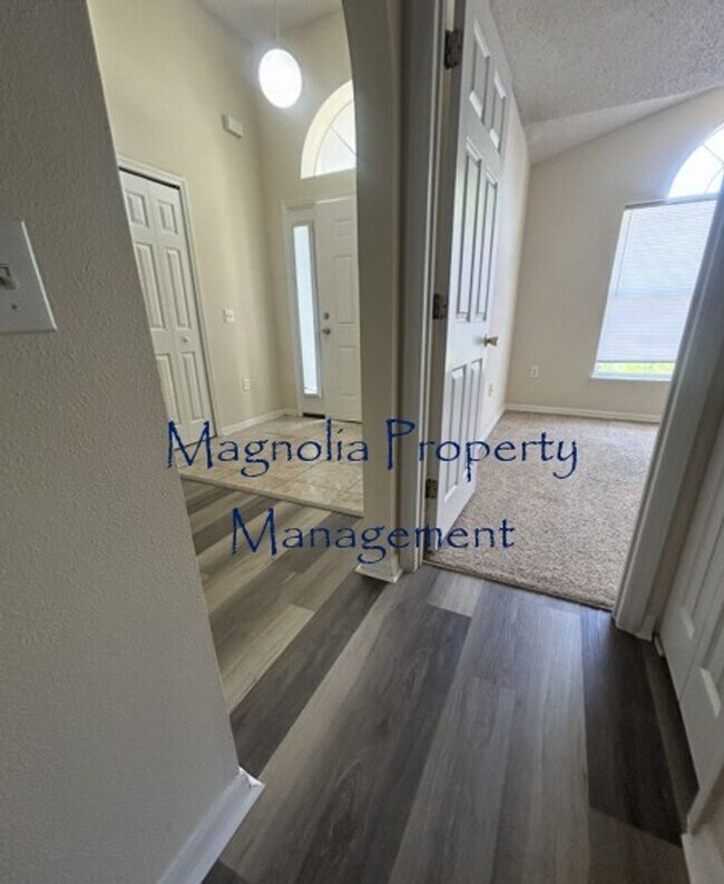 Building Photo - New Paint, Floors and Solid Surface Counte...