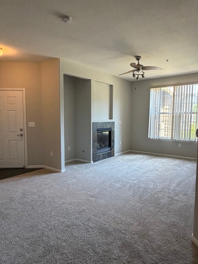Living room with fireplace - 1465 Blue Sky Cir