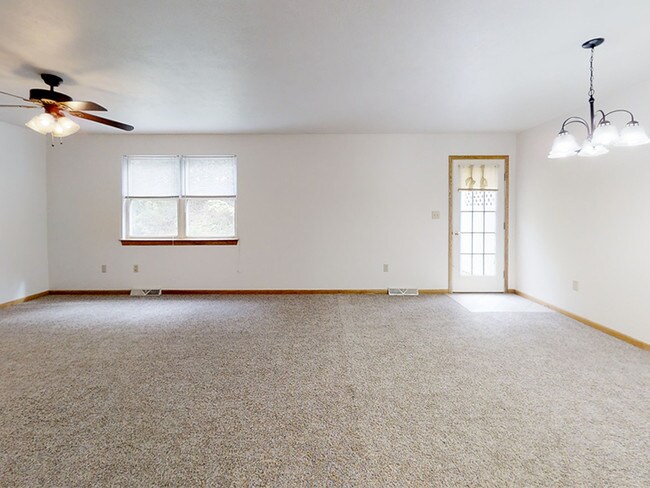 Living Room / Dining Room & Door to Patio - 7159 Jacob Ln
