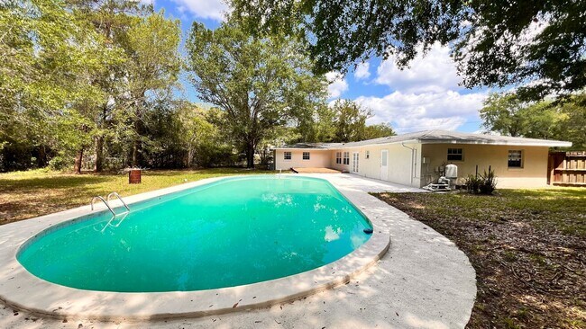 Building Photo - GREAT 4 bedroom 2 bath POOL HOME in Orange...