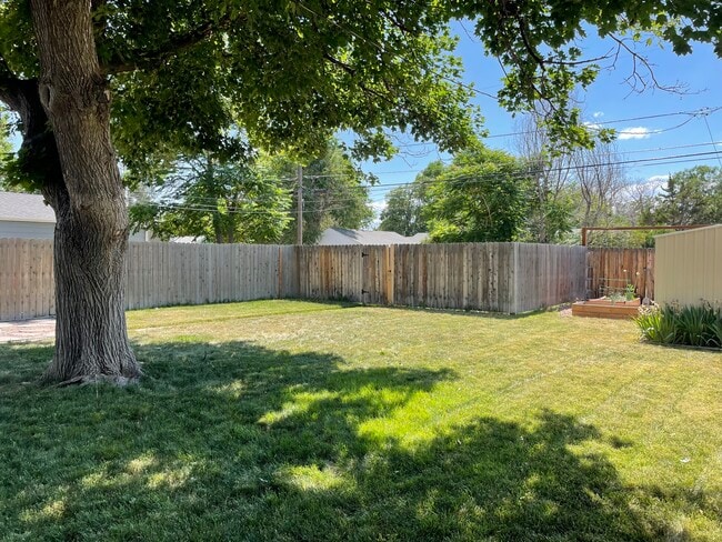 Access to alley with a fenced area to park up to 2 cars - 1335 Dallas St