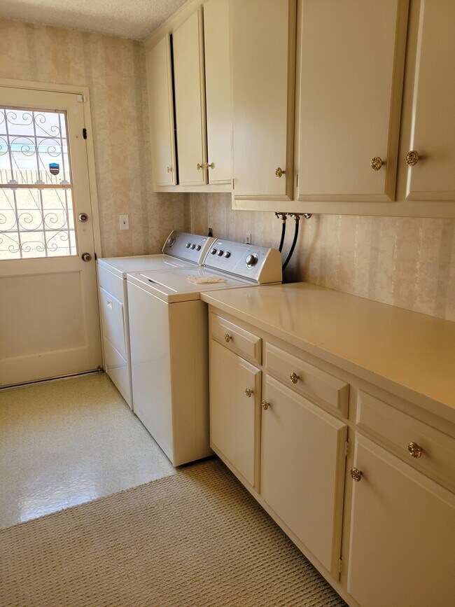 Large laundry room with w/d - 1660 S Tiara Way
