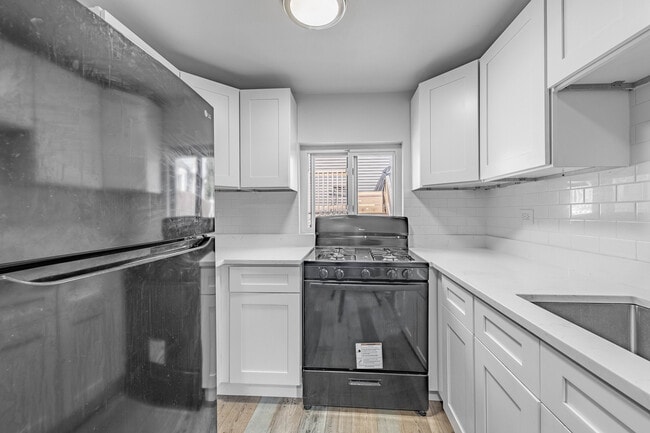 Building Photo - 5551 S Menard Ave
