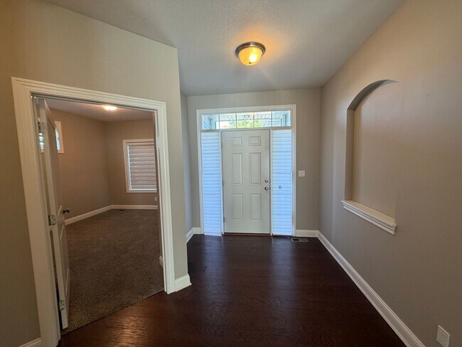 Building Photo - Beautiful Single Family Home - Attached 3 Car Garage with Fenced-In Backyard
