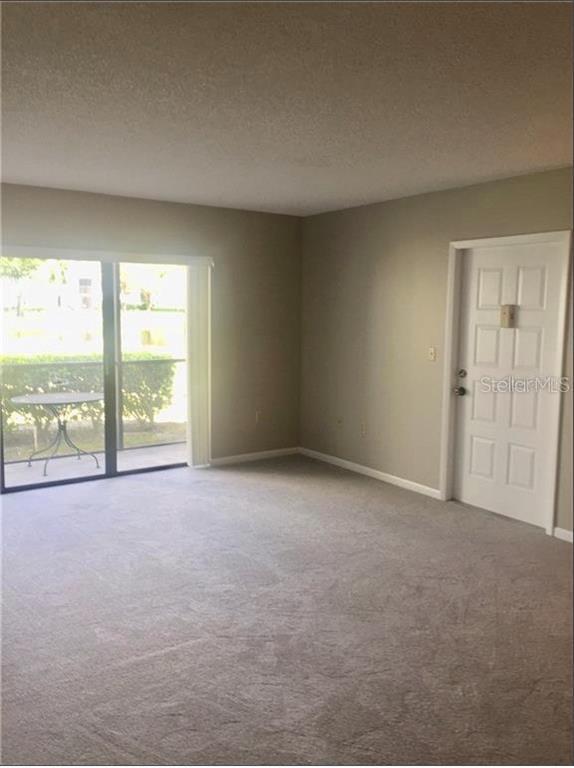 1151 Pine Ridge Cir W Unit B1, Tarpon Springs, FL 34688 Condo for
